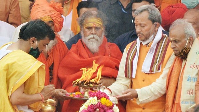 File photo of Uttarakhand Chief Minister Tirath Singh Rawat (second from right) in Haridwar | Photo: ANI