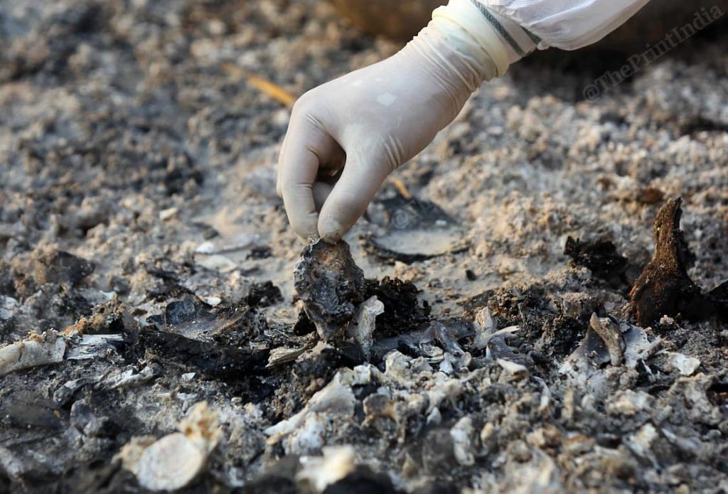 Crematorium workers have been working at the crematorium for longer hours. They collect the ashes of Covid-19 bodies | Suraj Singh Bisht | ThePrint