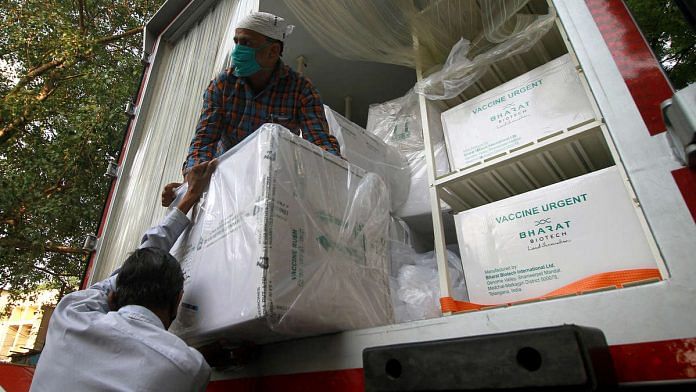 File photo of workers unloading boxes of Bharat Biotech's Covaxin | Photo: ANI