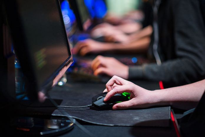 Gamers Compete In A Counter-Strike: Global Offensive Tournament