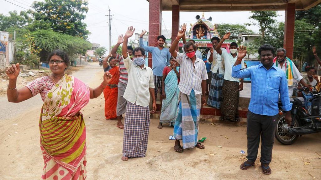 Krishnapatnam residents raise their hands when asked who all had taken Anandaiah's herbal concoction | Photo: Manisha Mondal | ThePrint