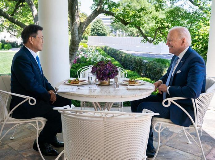 US President Joe Biden in conversation with South Korean counterpart Moon Jae-In at the White House on 22 May 2021 | Twitter/@POTUS