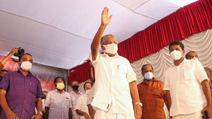 Kerala CM Pinarayi Vijayan waves to his supporters at a rally on 21 March 2021 in Kochi | Twitter| @vijayanpinarayi