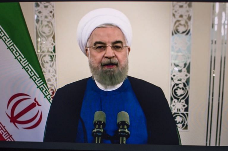 Iran’s Rouhani says world powers accept sanctions should end; crude oil prices drop
