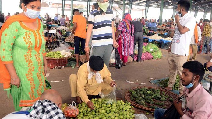 People shop at a vegetable mandi in Jalandhar, Punjab, in April 2021 | ANI
