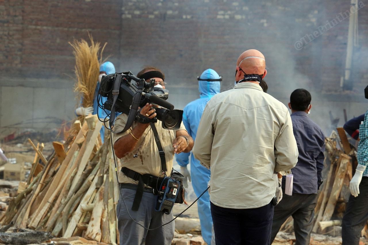 Foreign media at the Seemapuri cremation ground in New Delhi | Praveen Jain | ThePrint