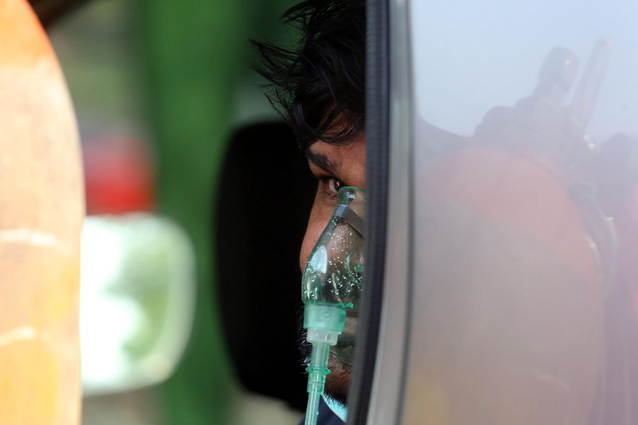 A man sits in an auto-rickshaw outside the Indirapuram Gurudwara | Praveen Jain | ThePrint