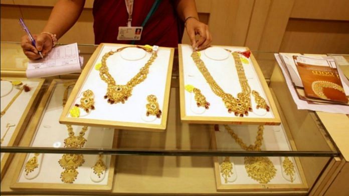 Gold jewellery displayed on counter | Bloomberg