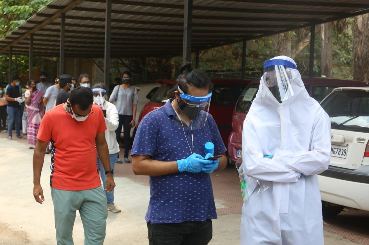 Shubham Mehta, 25, turned up at the vaccination centre in the complete PPE kit | Praveen Jain | ThePrint