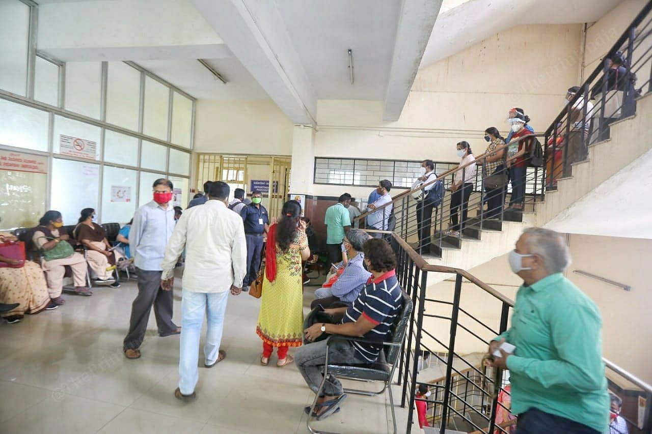 Bengaluru residents wait to be vaccinated at the city's Bowring and Lady Curzon Hospital | Praveen Jain | ThePrint