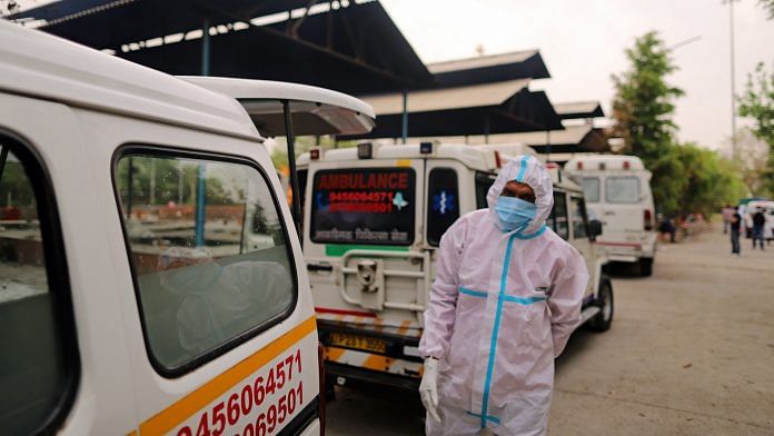 Ambulances lined up at a crematorium on the outskirts of New Delhi, on 23 April 2021 | Image via Bloomberg