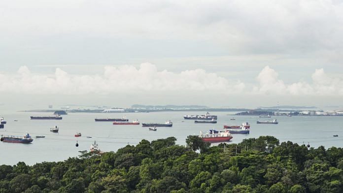 Container ships and bulk carriers offshore from Singapore | Bloomberg
