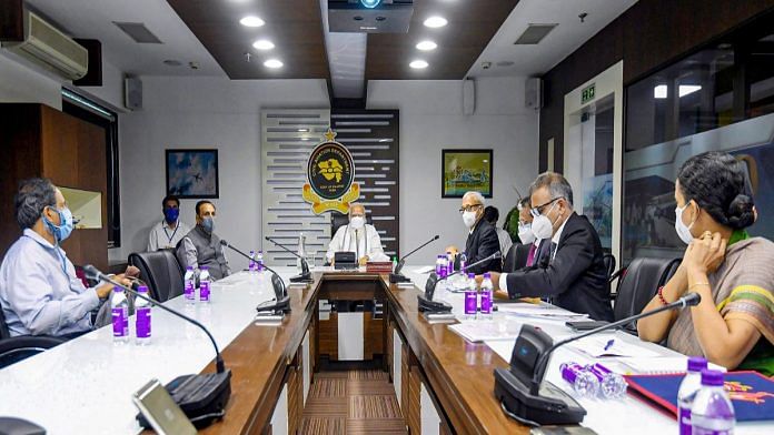 PM Narendra Modi with Gujarat CM Vijay Rupani (L) holds a review meeting with the officials to assess the damage caused by Cyclone Tauktae in Ahmedabad, on 19 May 2021 | PTI