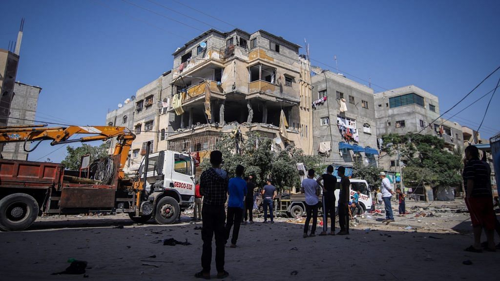Damaged residential buildings following Israeli airstrikes in Khan Yunis, Gaza, on 12 May 2021 | Photo: Ahmad Salem | Bloomberg