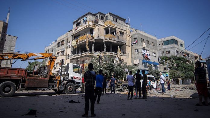 Damaged residential buildings following Israeli airstrikes in Khan Yunis, Gaza, on 12 May 2021 | Photo: Ahmad Salem | Bloomberg