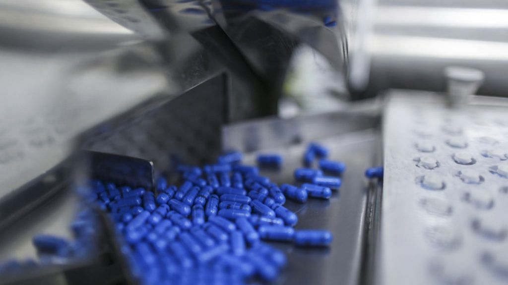 Ramipril capsules move along the production line at the Lupin Ltd. pharmaceutical plant in Salcette, Goa | Photographer: Dhiraj Singh | Bloomberg