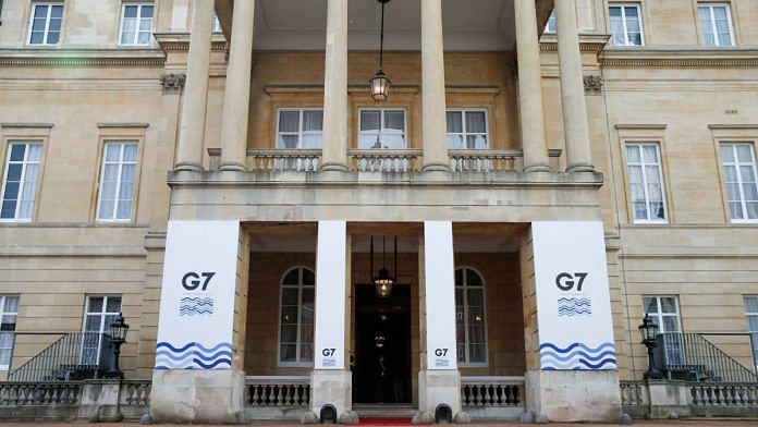 Banners at an entrance to Lancaster House, the venue for the G-7 foreign and development ministers meeting in London, on May 2021 | Photographer: Hollie Adams | Bloomberg