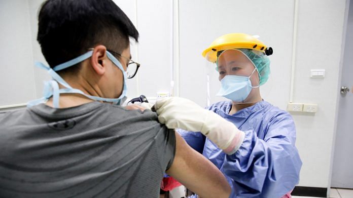 A nurse administers the AstraZeneca vaccine at Chang Gung Memorial Hospital in Taipei