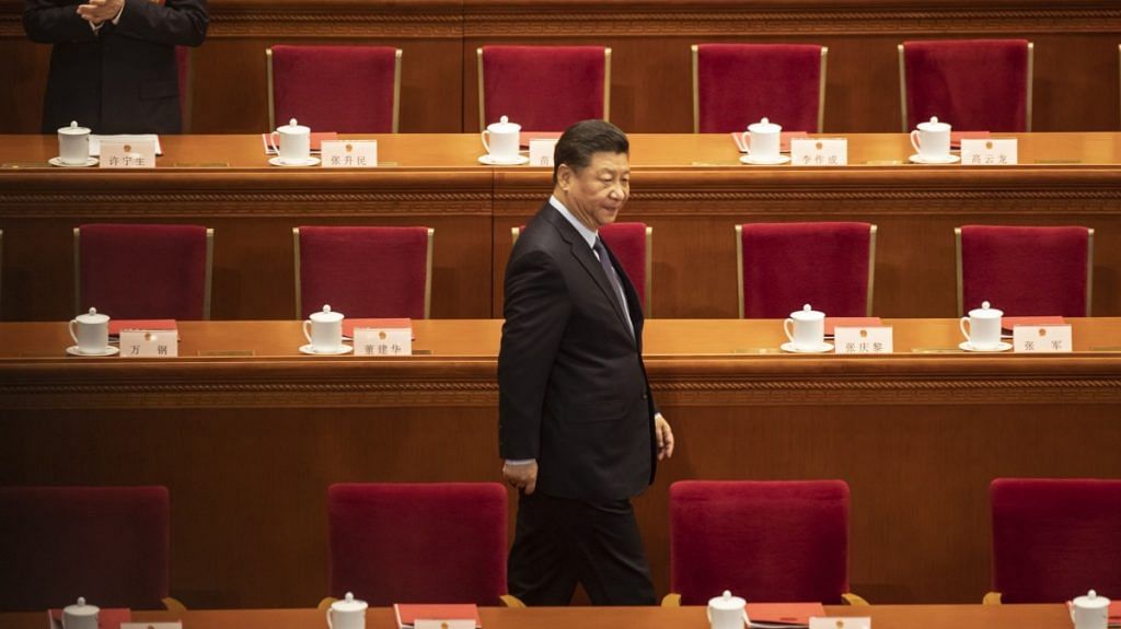 Xi Jinping attends the closing of the Second Session of the 13th National People's Congress at the Great Hall of the People in Beijing | Photographer: Qilai Shen | Bloomberg