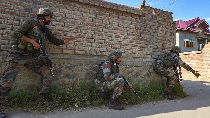 Security personnel during an encounter with militants, at Maloora on the outskirts of Srinagar, on 28 June 2021