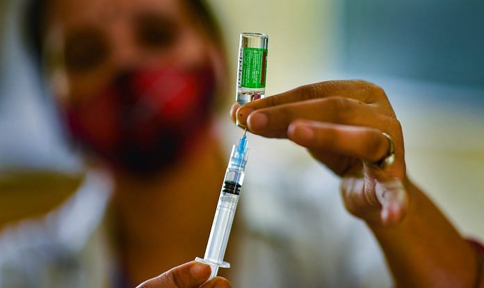 COVID-19 vaccination in Ghaziabad File photo | A health worker in Ghaziabad prepares a dose of the Covid-19 vaccine | PTI