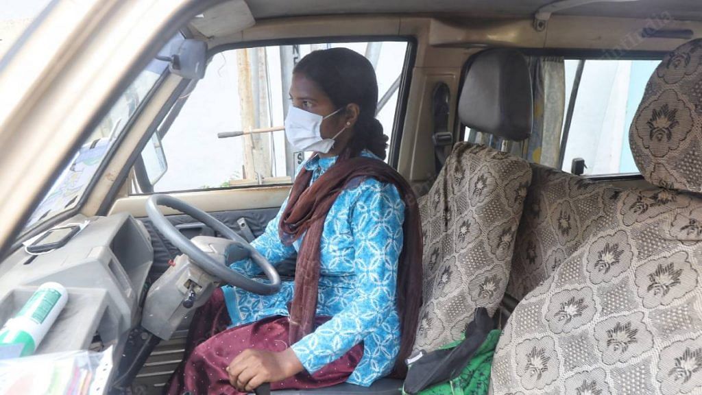 Churki behind the wheels of her van, delivering oxygen concentrators | Manisha Mondal | ThePrint