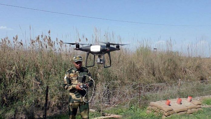 A BSF trooper operates a drone near Chenab river, Akhnoor, in Jammu, in this February 2021 image | Representational photo | ANI