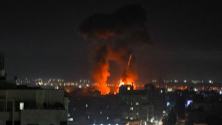 Israel launches air strikes in Gaza in response to incendiary balloons, challenging truce