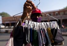 Protective masks being sold by a vendor in Jaipur