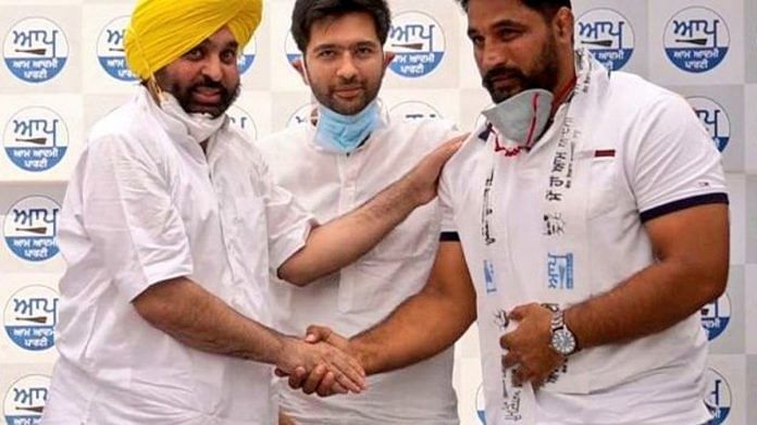 AAP Punjab affairs co-incharge Raghav Chadha, state unit chief and MP Bhagwant Mann with Kabaddi player Gurlal Ghanaur in Chandigarh, on 14 June 2021 | Twitter/@raghav_chadha AAP Punjab affairs co-incharge Raghav Chadha, state unit chief and MP Bhagwant Mann with Kabaddi player Gurlal Ghanaur in Chandigarh, on 14 June 2021 | Twitter/@raghav_chadha