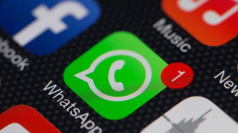 WhatsApp and Facebook logo | Bloomberg