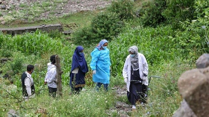 A team of healthcare workers on their way to a vaccination drive in Kashmir's Naranag village in Ganderbal district | Photo: Praveen Jain | ThePrint