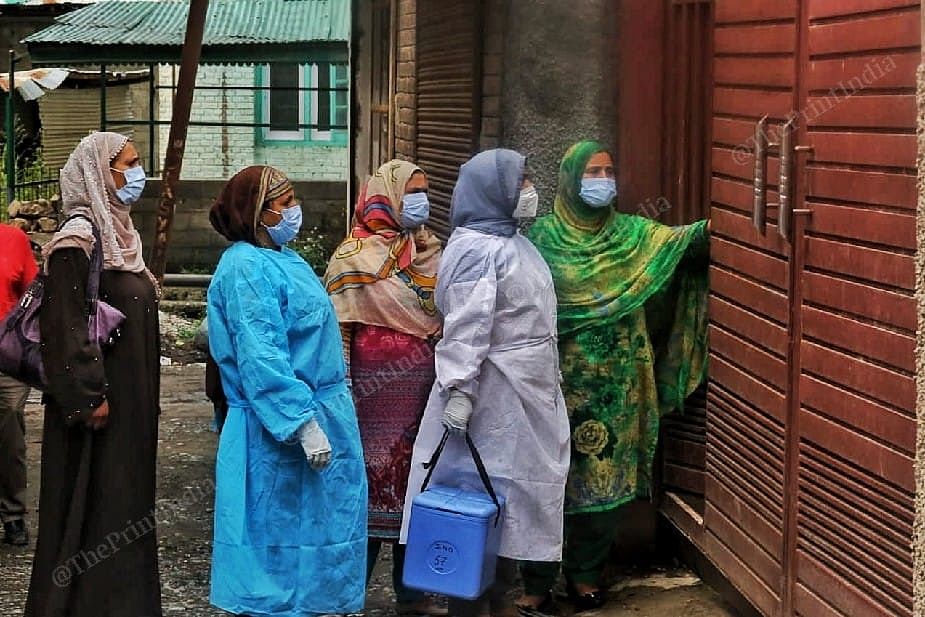 Health worker door to door vaccination campaign at the Sonerwani village in Bandipora Distt in Kashmir | Photo: Praveen Jain | ThePrint