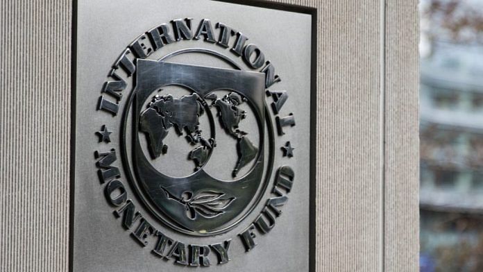 Signage displayed outside the IMF | Alex Wroblewski | Bloomberg