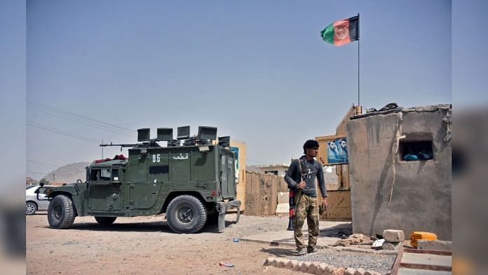 A member of the Afghan security forces stands guard at the site of a car bomb attack in Kandahar, on 6 July 2021 | Representational image | Photographer: Javed Tanveer/AFP/Getty Images via Bloomberg