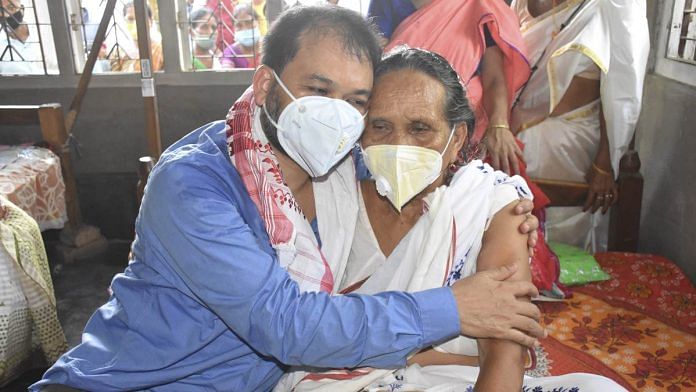 File photo of MLA Akhil Gogoi with his mother at Selenghat village in Assam's Jorhat, after an NIA court granted him 2-day parole in June 2021 | Photo: PTI