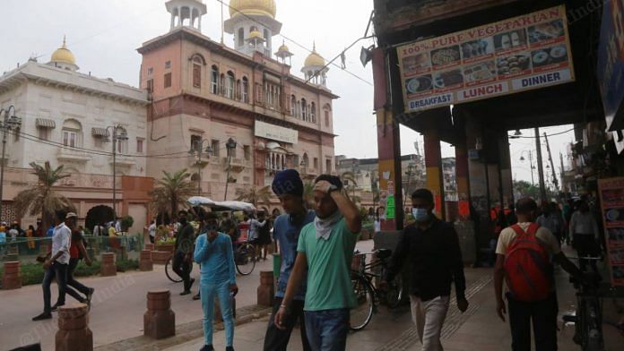 People walk on the newly laid pavements in Chandni Chowk, a business hub that has stood the test of time in Delhi | Manisha Mondal | ThePrint