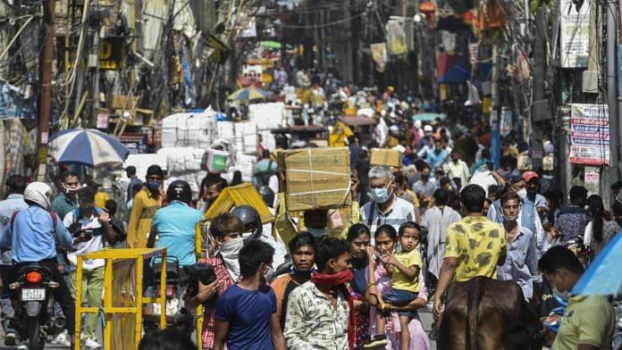 Crowd at Sadar Bazar market after authorities eased Covid-induced restrictions in New Delhi, 14 June 2021 | PTI