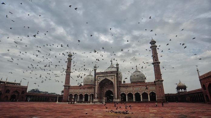 Pigeons fly as Jama Masjid wears an almost deserted look on the occasion of Eid al-Adha, in New Delhi | Suraj Singh Bisht | ThePrint