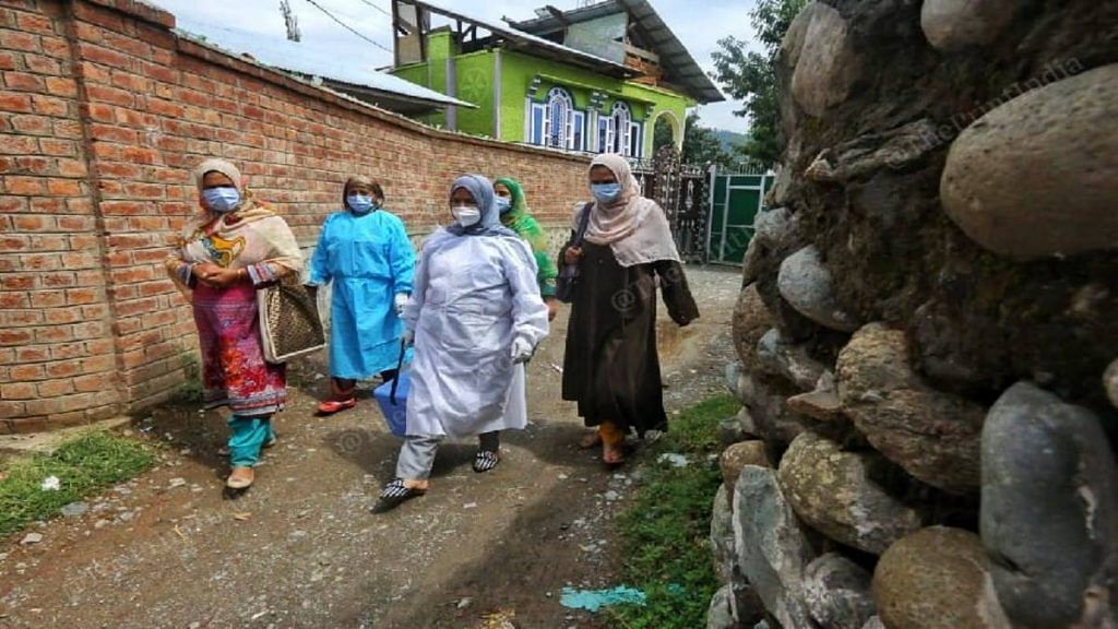 Health workers during a door to door vaccination campaign at Sonerwani village in Bandipora district in Kashmir | Praveen Jain | The Print 