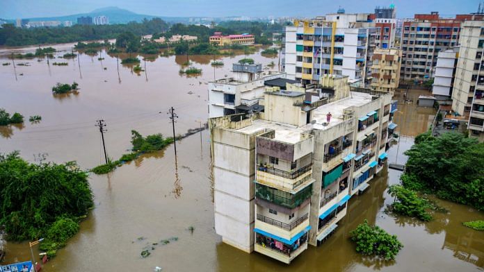 Flooded locality at Badlapur after heavy rains in Mumbai on 22 July 2021| PTI