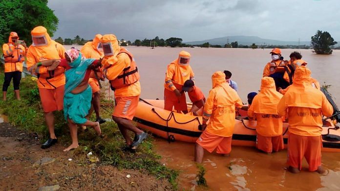 NDRF team during a rescue operation at a fooded area after rain in Kolhapur, on 25 July 2021 | PTI