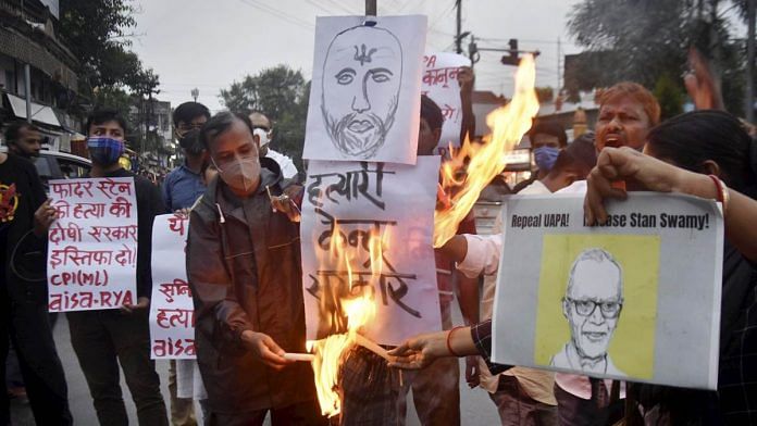 People protest in Ranchi on 5 July 2021 after the death of tribal activist Stan Swamy, an accused in the Elgar Parishad case, in a Mumbai hospital | Photo: PTI