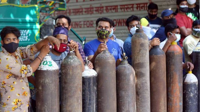 Representational Image | File photo of people waiting in queue in Delhi to get oxygen cylinders refilled during the second Covid wave | Suraj Singh Bisht | ThePrint