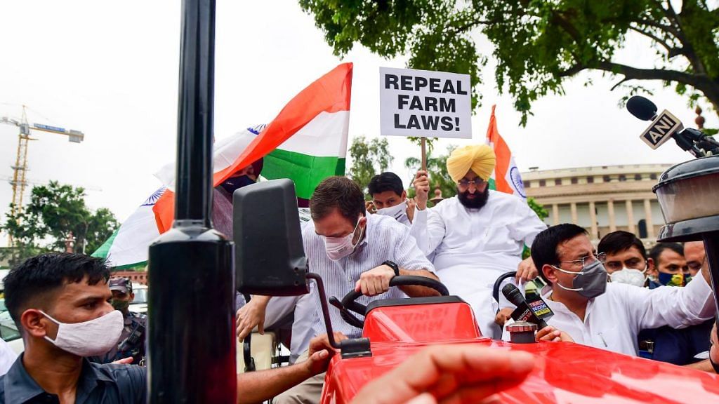 Congress leader Rahul Gandhi on a tractor outside the Parliament, in support of farmers agitation against Centres farm reform laws, in New Delhi Monday, on 26 July 2021 | PTI