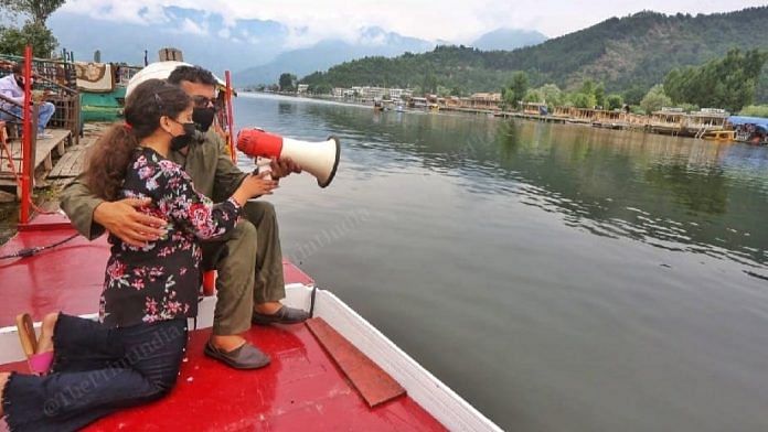 Father Ahmad Patloo and daughter Jannat ask tourists to wear masks and take vaccination. | Photo: Praveen Jain | ThePrint