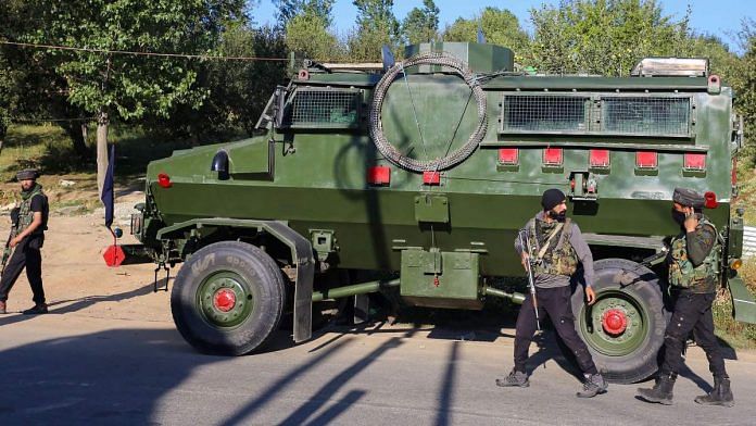 Security personnel during an encounter with militants at Kralgund area of Handwara in Kupwara district, on 7 July 2021 | PTI