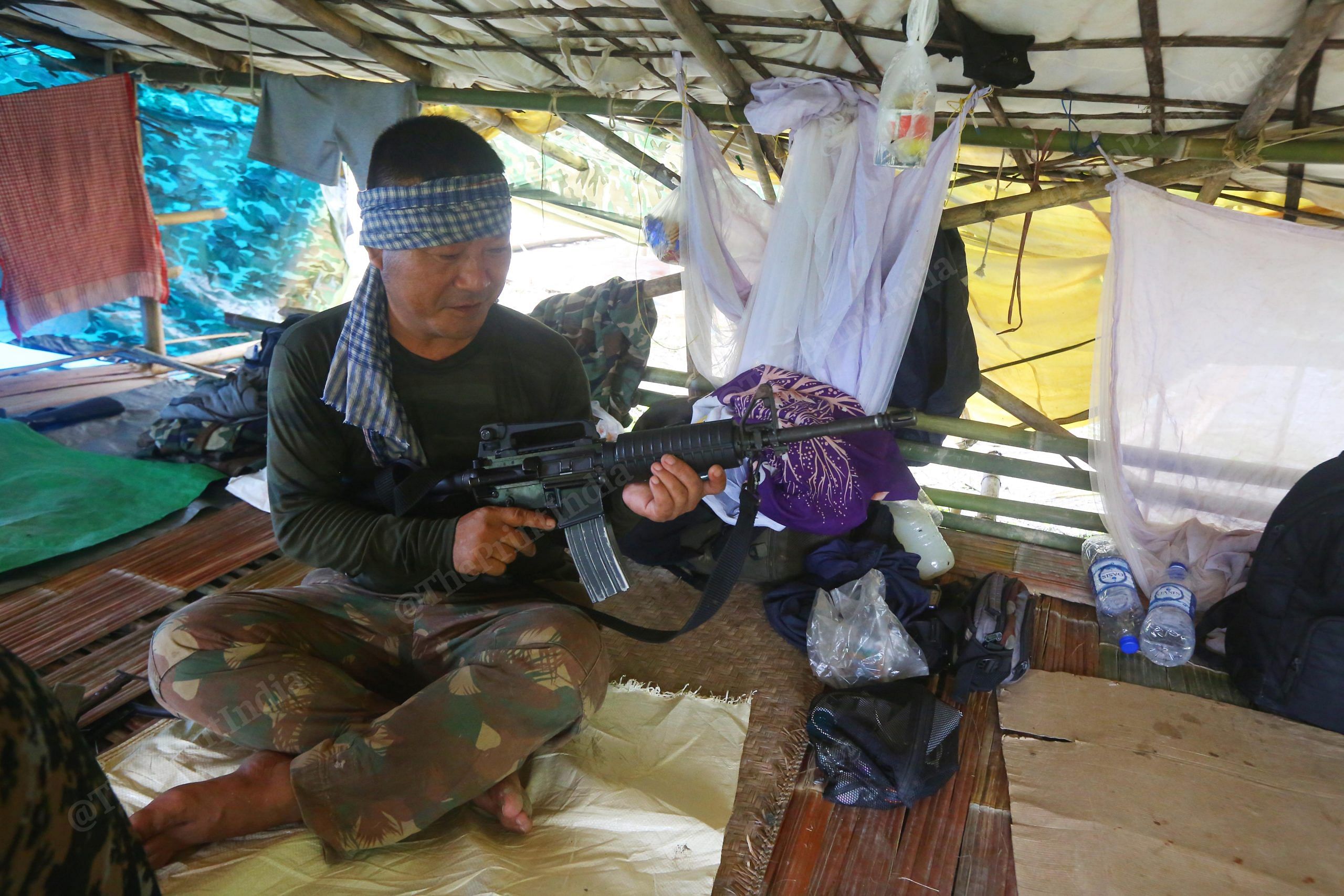 A Mizoram police personal inspecting his rifle | Photo: Praveen Jain | ThePrint