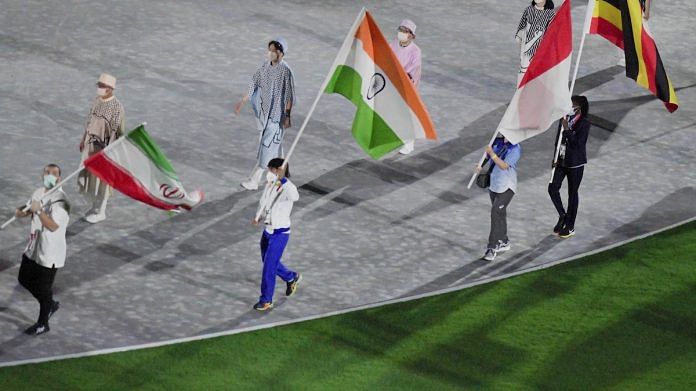 File photo | Bronze medalist Bajrang Punia holds the Indian flag at the Olympics Stadium during the closing ceremony, Tokyo, 8 August 2021 | PTI