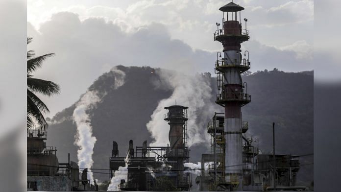 Emissions rise from chimneys at the ONGC Uran plant in Maharashtra | Photographer: Dhiraj Singh | Bloomberg